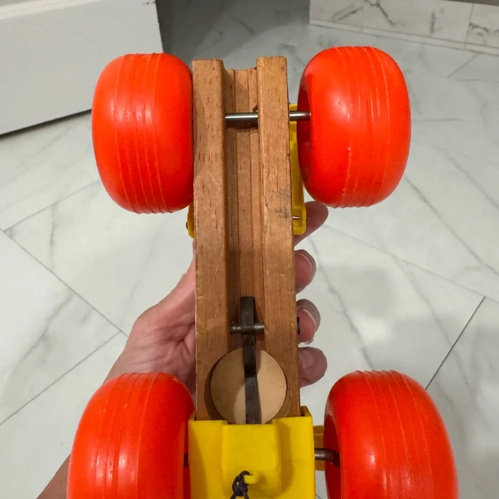 Vintage Fisher Price Jolly Jallopy pull toy from 1974.
